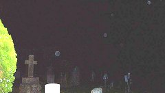 Orbs floating around Prestbury Churchyard