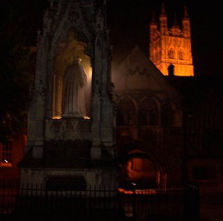 A very atmospheric picture of Bishop Hoopers monument looking towards Gloucester Cathedral